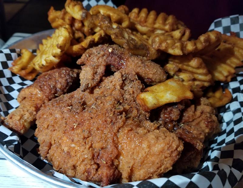 The Jacona Boys' chicken at the new Bushels Crab House on The Highway honors the onion with French's crispy onion batter, onion jam and an onion roll. A match made in onion heaven. BOB YESBEK PHOTO
